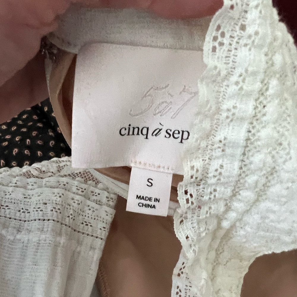 White cinq a sep lace top with high neck- worn once . Size small